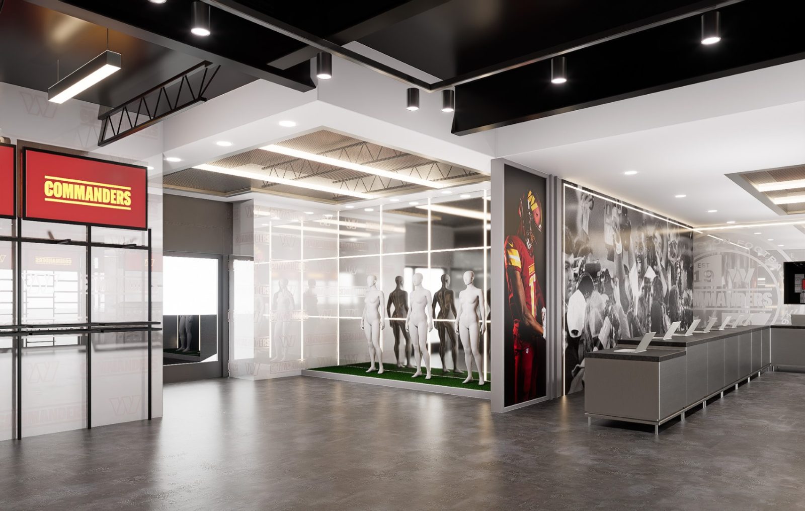 Interior of a Commanders team store with mannequins, memorabilia displays, and a prominent Commanders sign