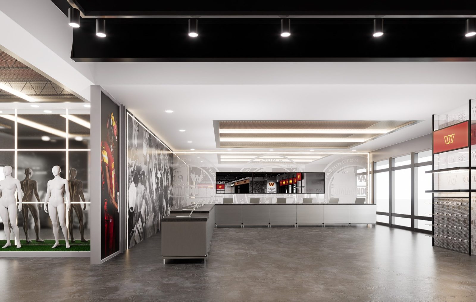 Interior of a Washington Commanders team store with mannequins, merchandise displays, and the team's W logo