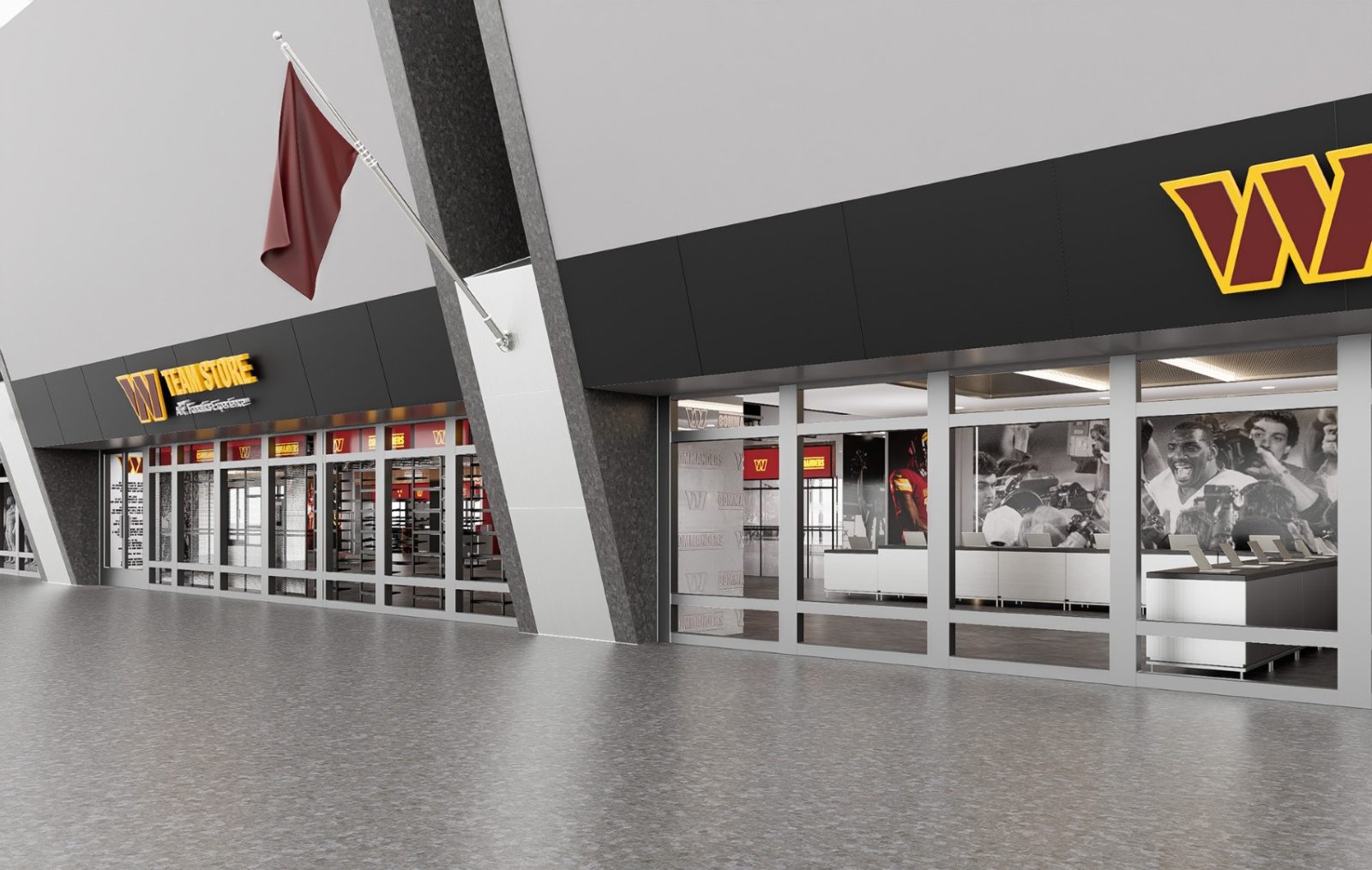 Exterior of a Washington Commanders team store with burgundy and gold branding, display windows, and a team history exhibit