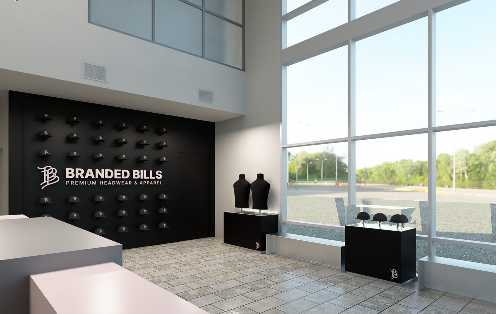 Branded Bills showroom with a wall display of caps, logo signage, mannequins, and product pedestals