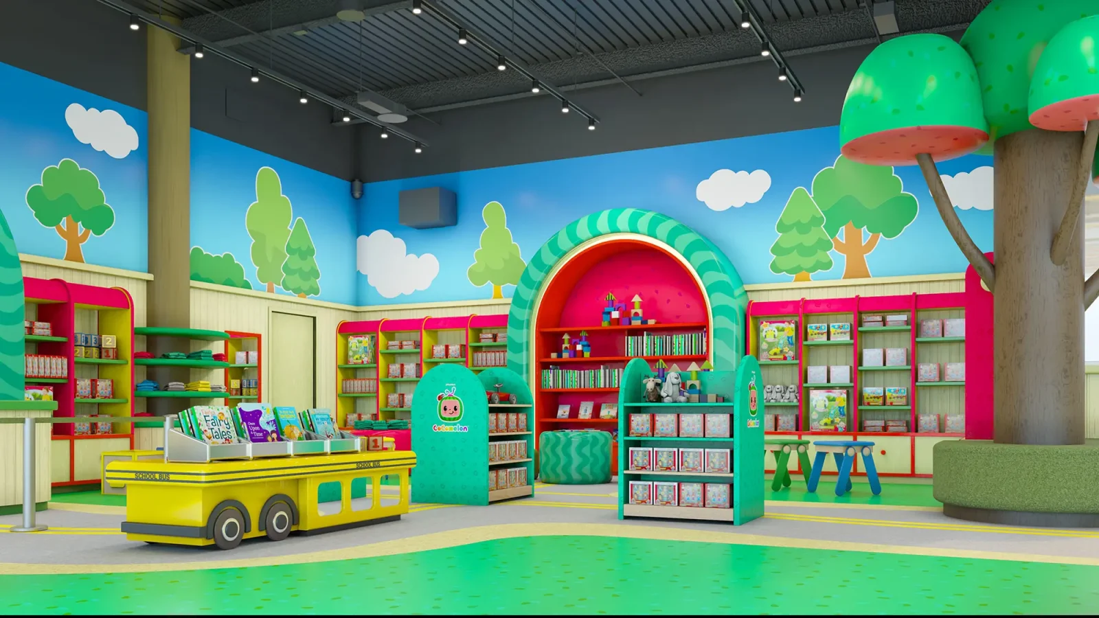 Colorful CoComelon-themed children's bookstore with bookshelves, a yellow school bus display, play tables, and cartoon forest murals