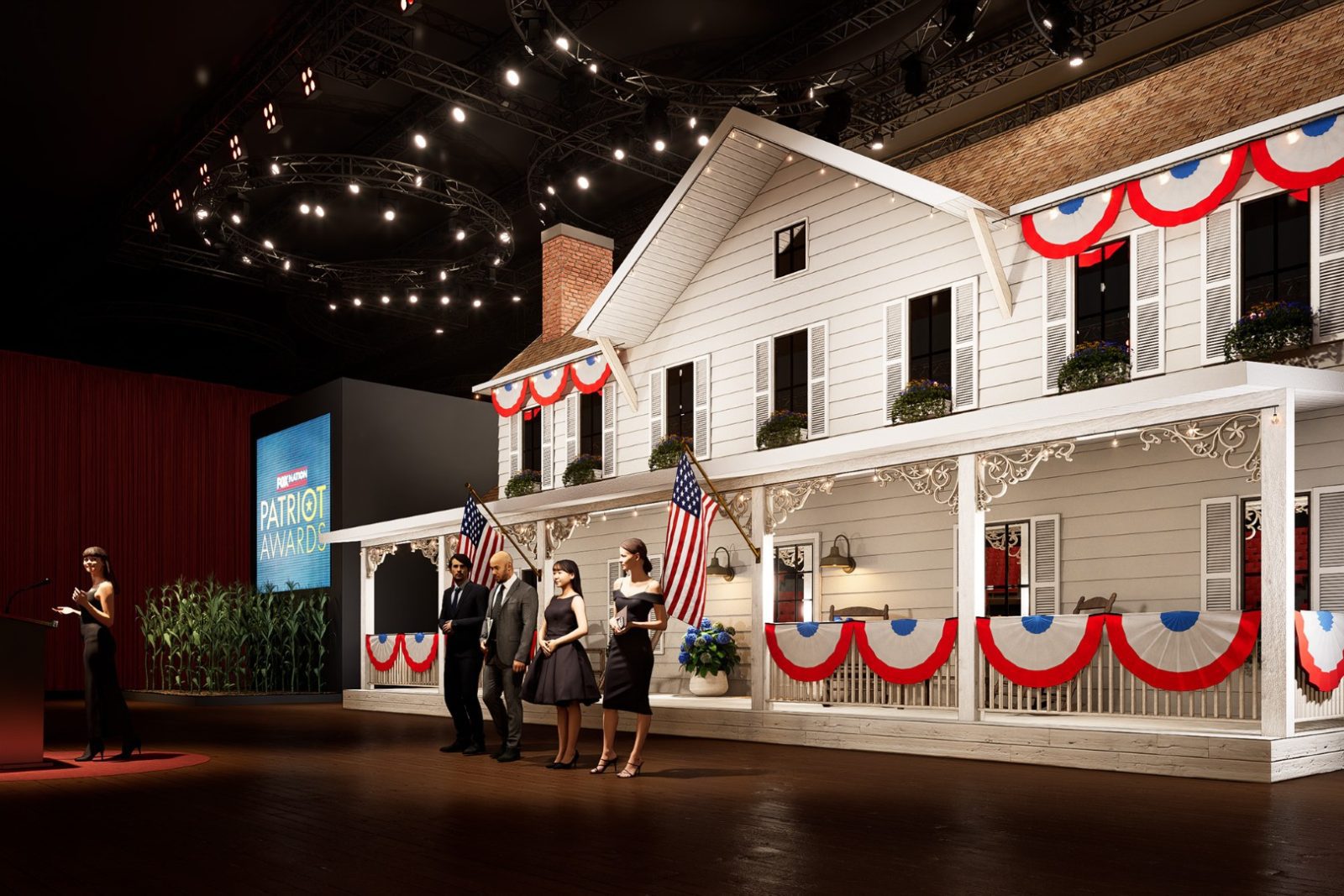 Patriotic stage set with a white house, bunting, American flags, four people, and a screen reading “Patriot Awards”