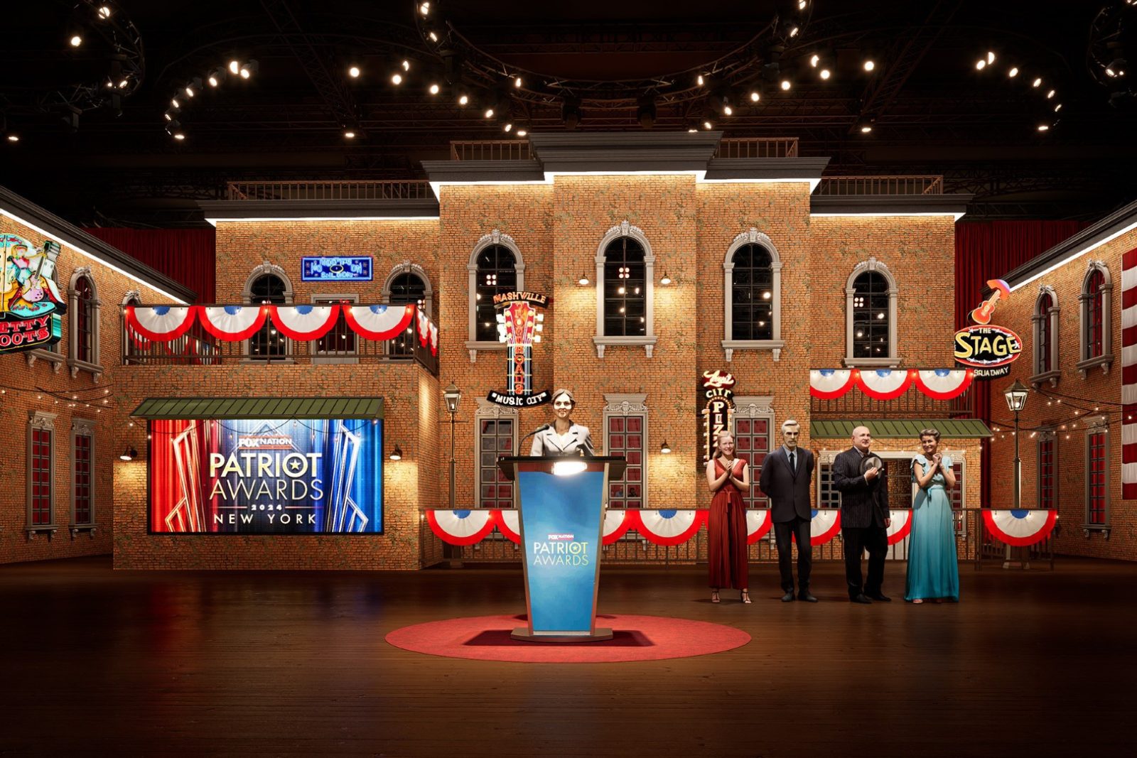 Stage set with a podium labeled Patriot Awards 2024 and a screen reading Patriot Awards 2024 New York, with four people behind it.
