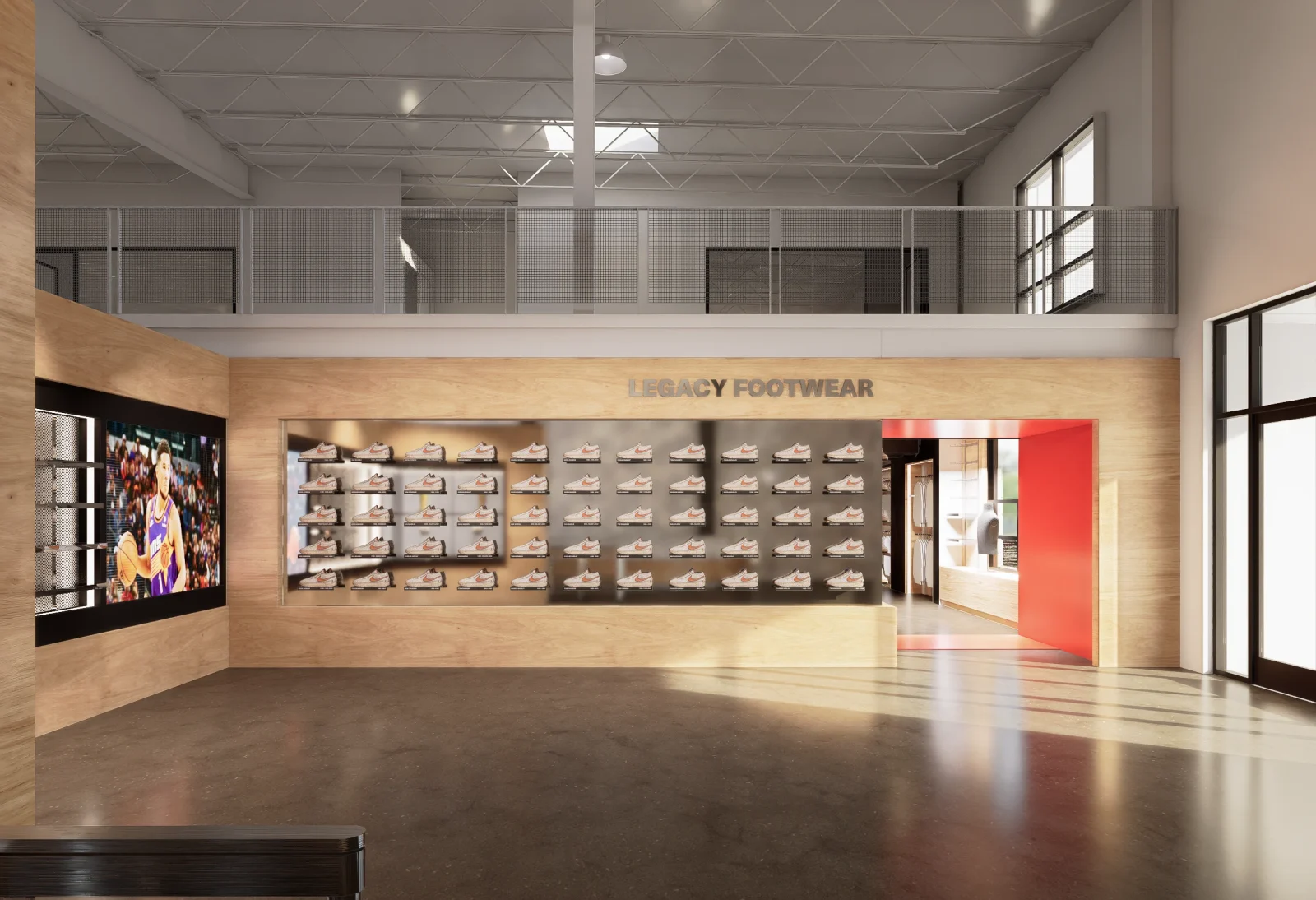 Modern footwear showroom with rows of sneakers displayed beneath the sign “LEGACY FOOTWEAR” and a basketball video screen